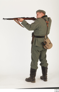 Photos German Soldier in historical uniform 4 WW II aim…